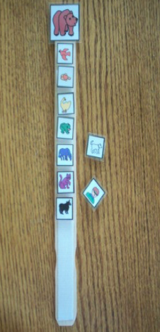 A velcro activity chart with picture blocks